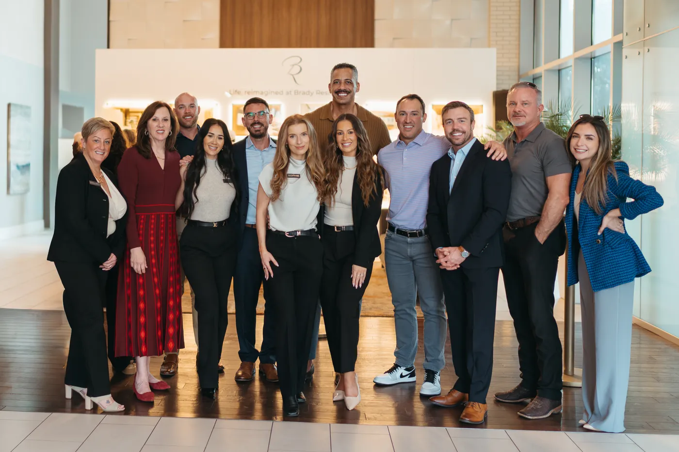 A company team photographed together at their own event