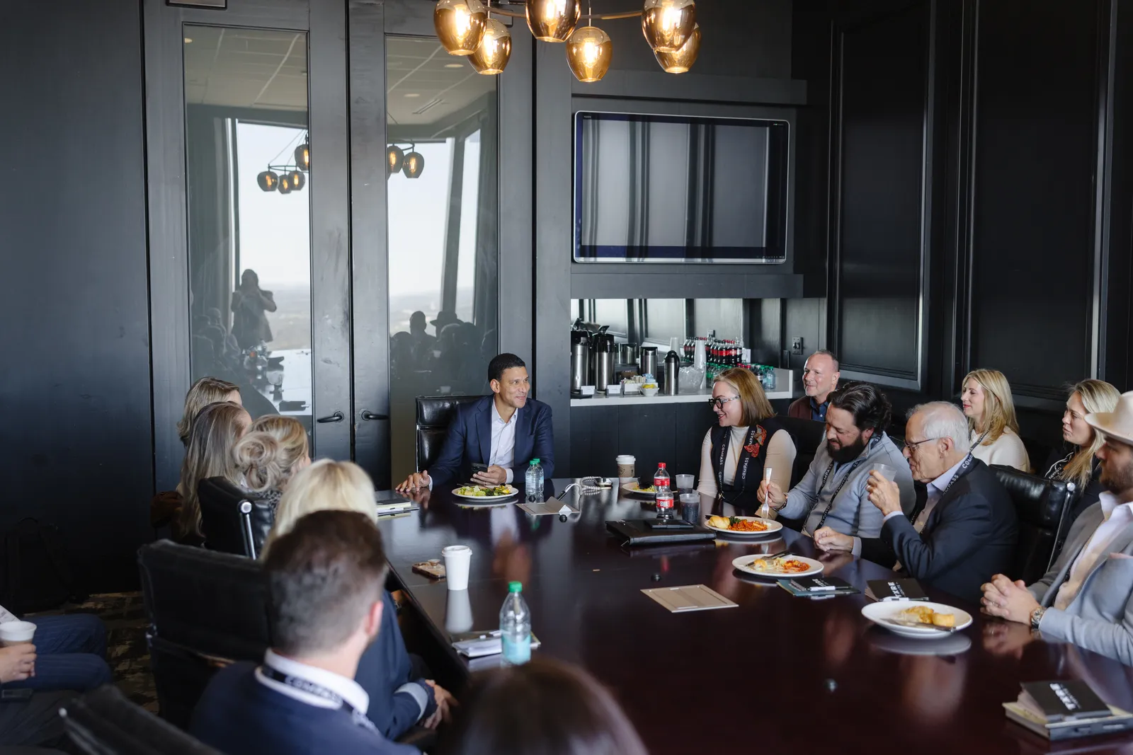 Guests at a corporate dinner in a private dining room